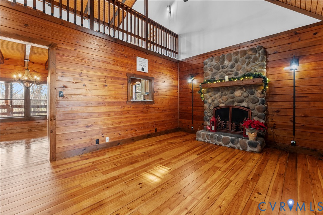 45 Morningside Road Cartersville, VA 23027 - Photo 8 of 50 a view of a livingroom with wooden floor and a fireplace