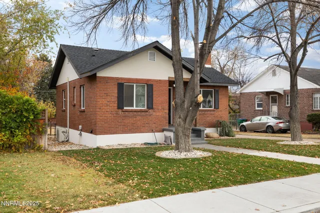 a front view of house with garden
