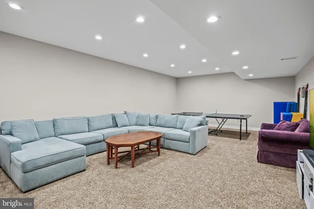a living room with furniture and a couch