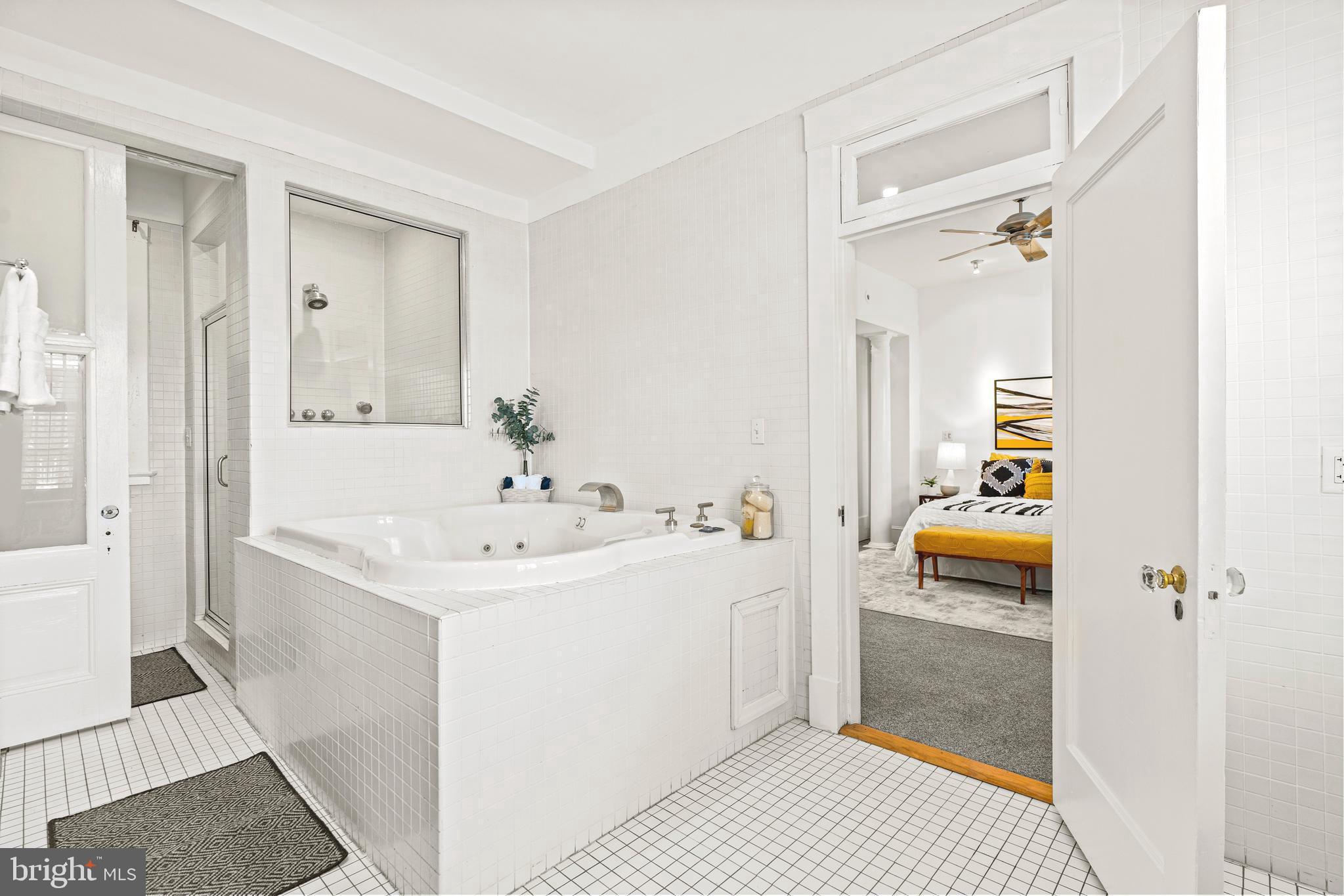 1736 Columbia Road Northwest, Unit 102 Washington, DC 20009 - Photo 19 of 37 a bathroom with a sink a toilet and shower