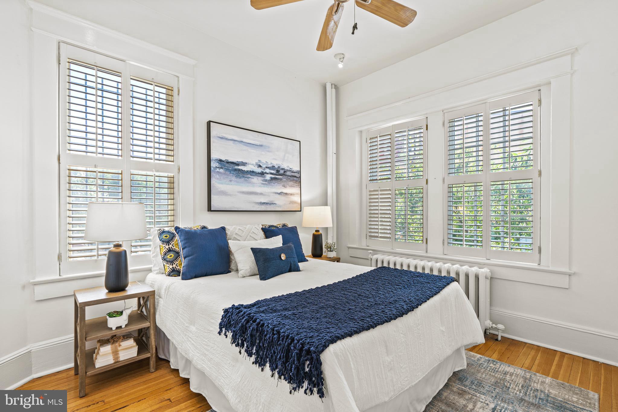 1736 Columbia Road Northwest, Unit 102 Washington, DC 20009 - Photo 25 of 37 a bedroom with bed and a window
