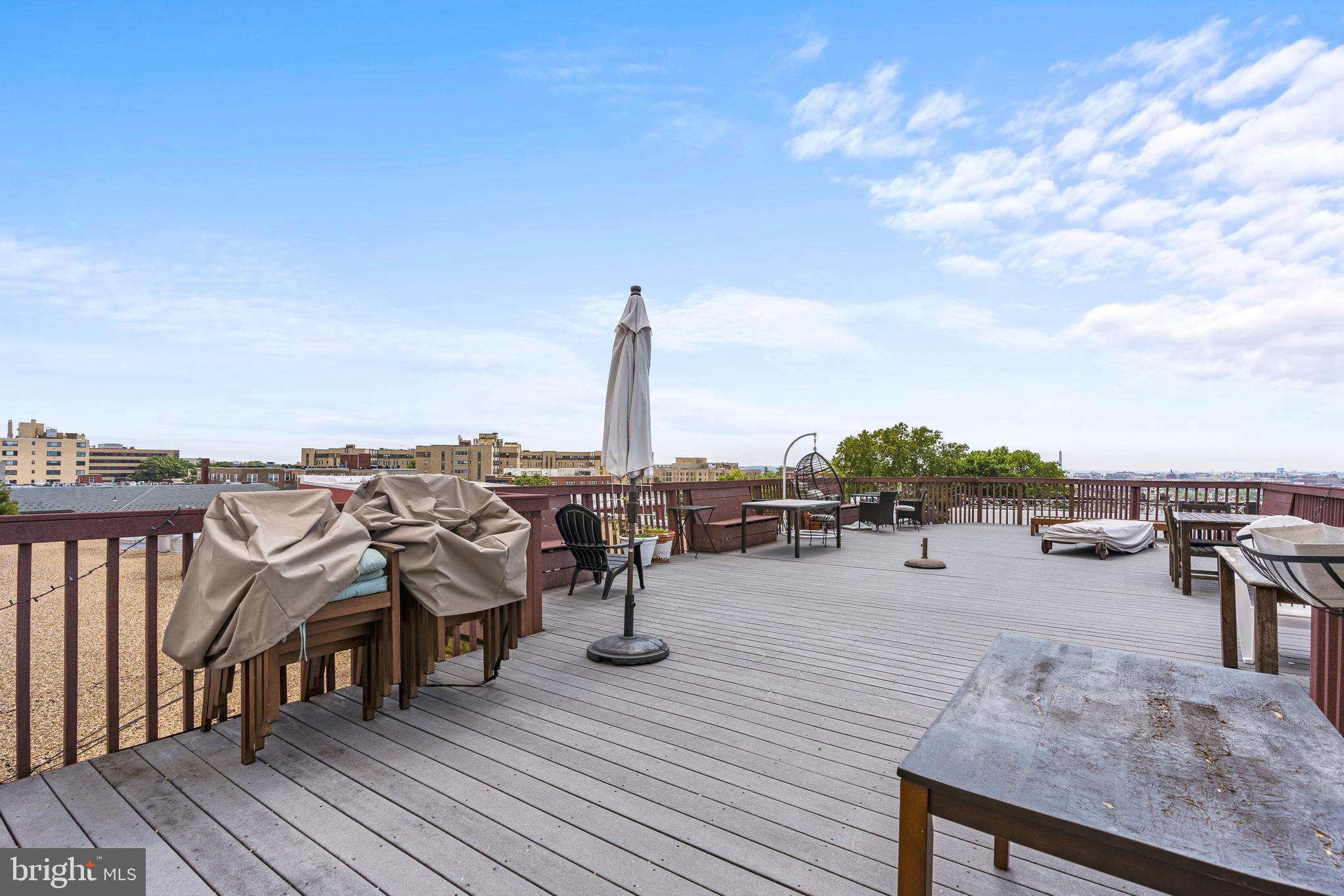 1736 Columbia Road Northwest, Unit 102 Washington, DC 20009 - Photo 29 of 37 a view of a terrace with sitting area