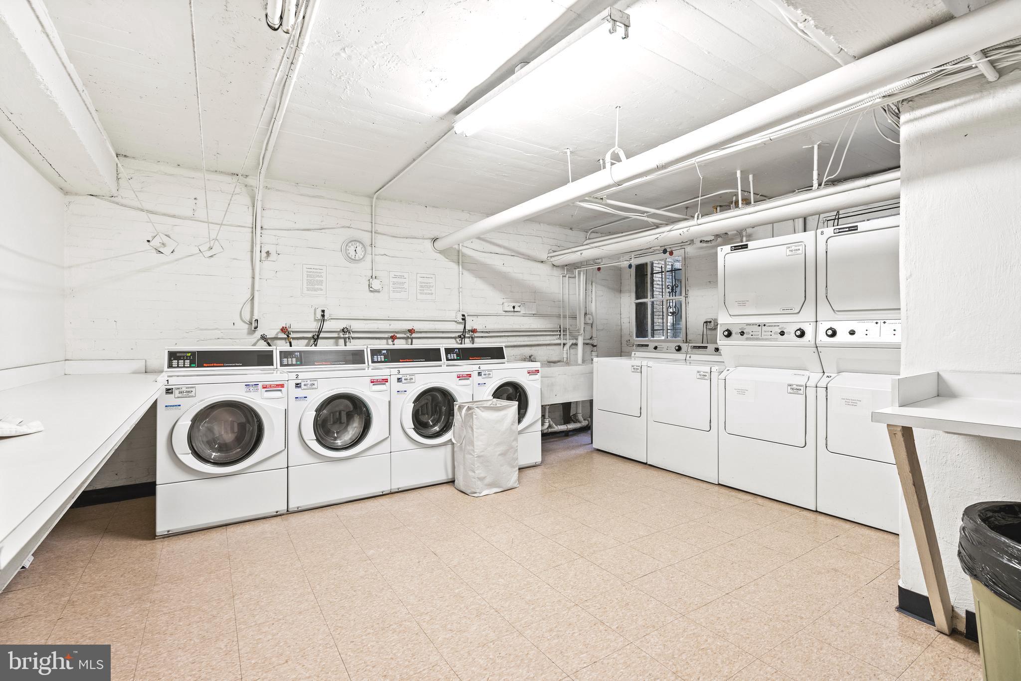 1736 Columbia Road Northwest, Unit 102 Washington, DC 20009 - Photo 31 of 37 a utility room with dryer and washer