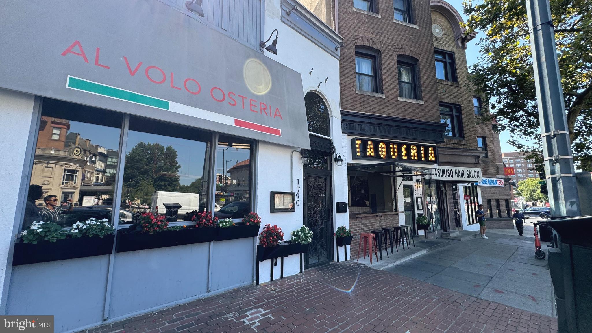 1736 Columbia Road Northwest, Unit 102 Washington, DC 20009 - Photo 34 of 37 a view of street with sitting area