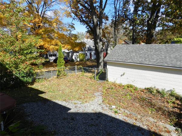 85 Appleton Street Springfield, MA 01108 - Photo 3 of 22 a view of a yard with large trees