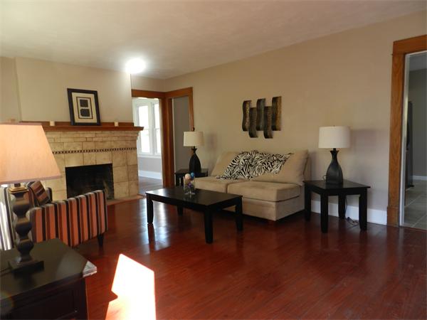 85 Appleton Street Springfield, MA 01108 - Photo 8 of 22 a living room with furniture and a fireplace