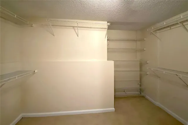 a view of a livingroom with furniture and furniture