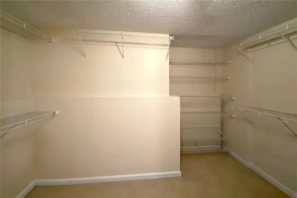 a view of a livingroom with furniture and furniture