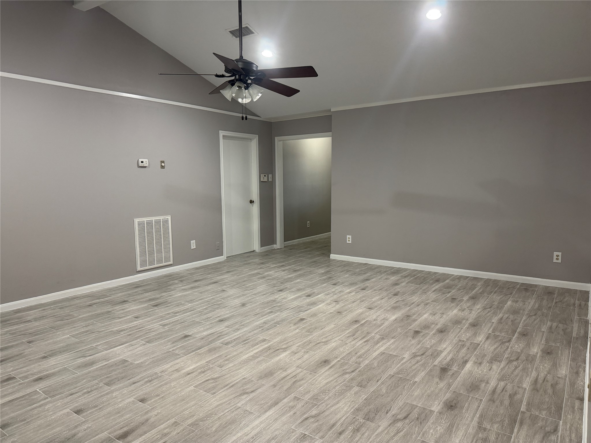 3815 Avenue R Rosenberg, TX 77471 - Photo 11 of 14 wooden floor in an empty room