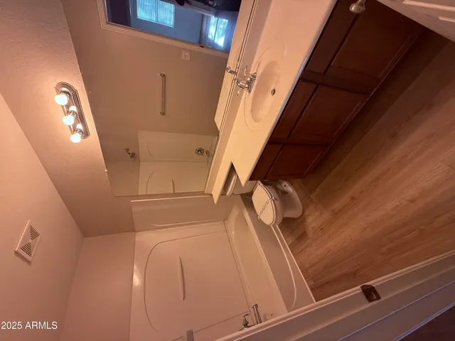 a view of entryway with wooden floor