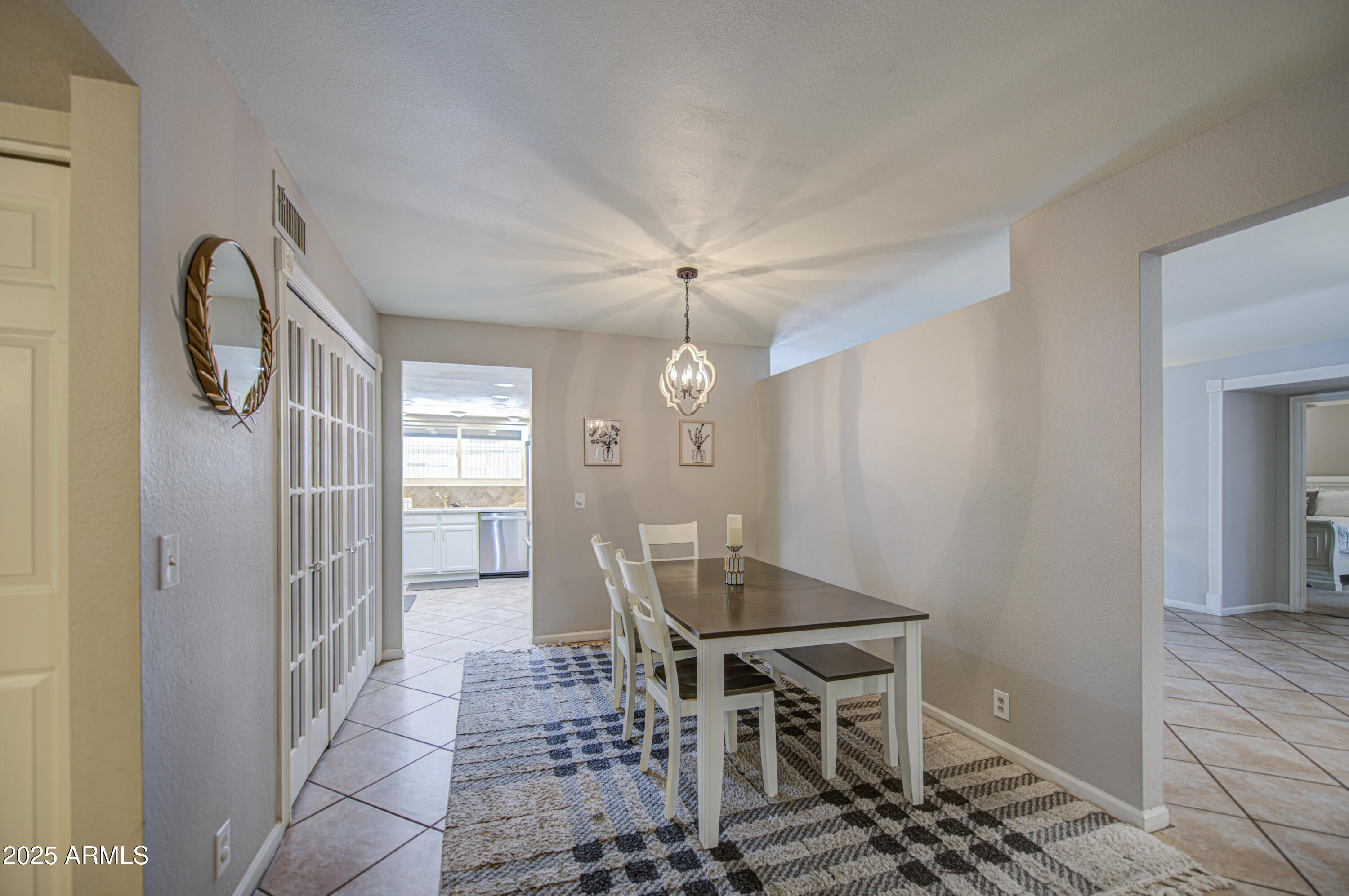 907 West Redfield Road Tempe, AZ 85283 - Photo 7 of 53 a dining room with furniture and window