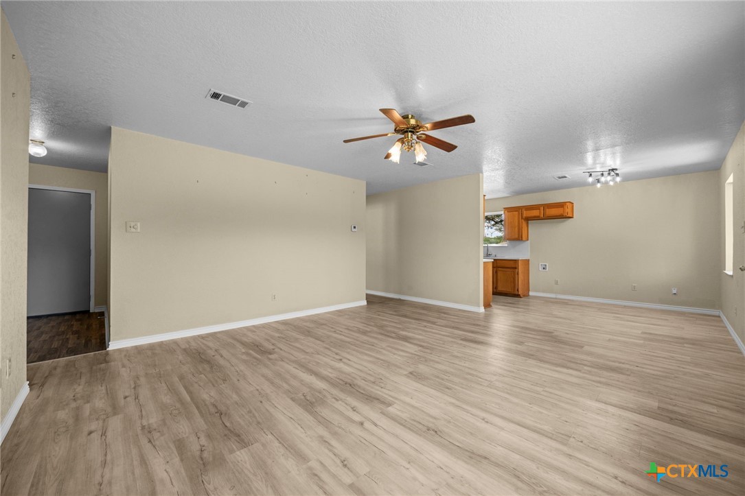 1012 Cherokee Trail Kempner, TX 76539 - Photo 15 of 27 a view of empty room with wooden floor
