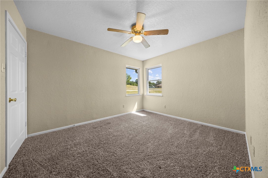 1012 Cherokee Trail Kempner, TX 76539 - Photo 25 of 27 a view of a livingroom with a ceiling fan and window