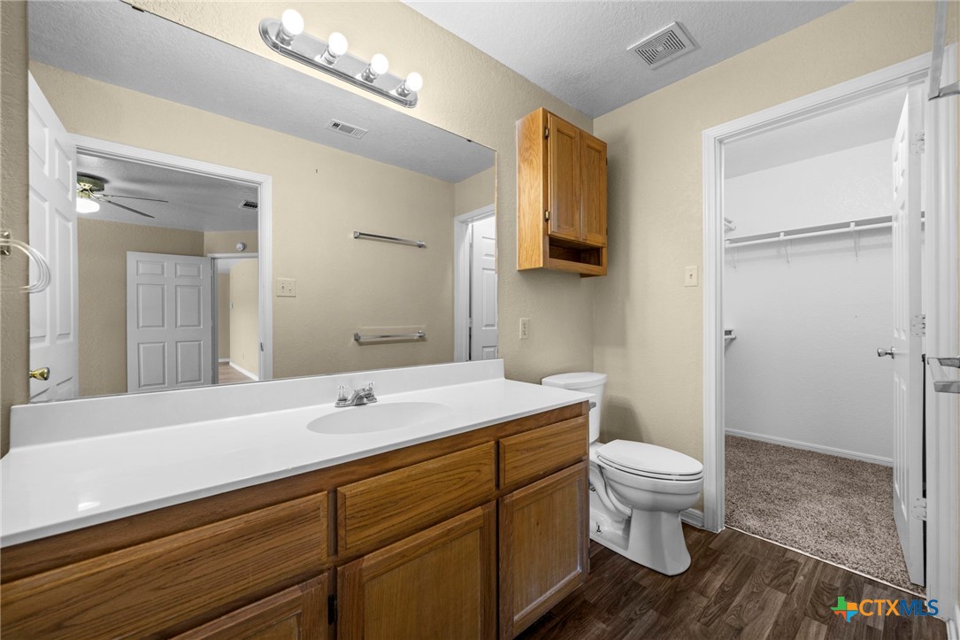 1012 Cherokee Trail Kempner, TX 76539 - Photo 9 of 27 a bathroom with a sink and a mirror