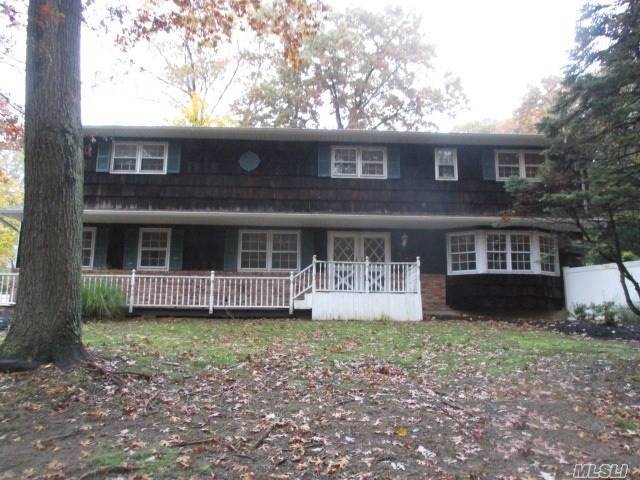 189 Lw Sheep Pasture Road East Setauket, NY 11733 - Photo 1 of 1 a front view of a house with garden