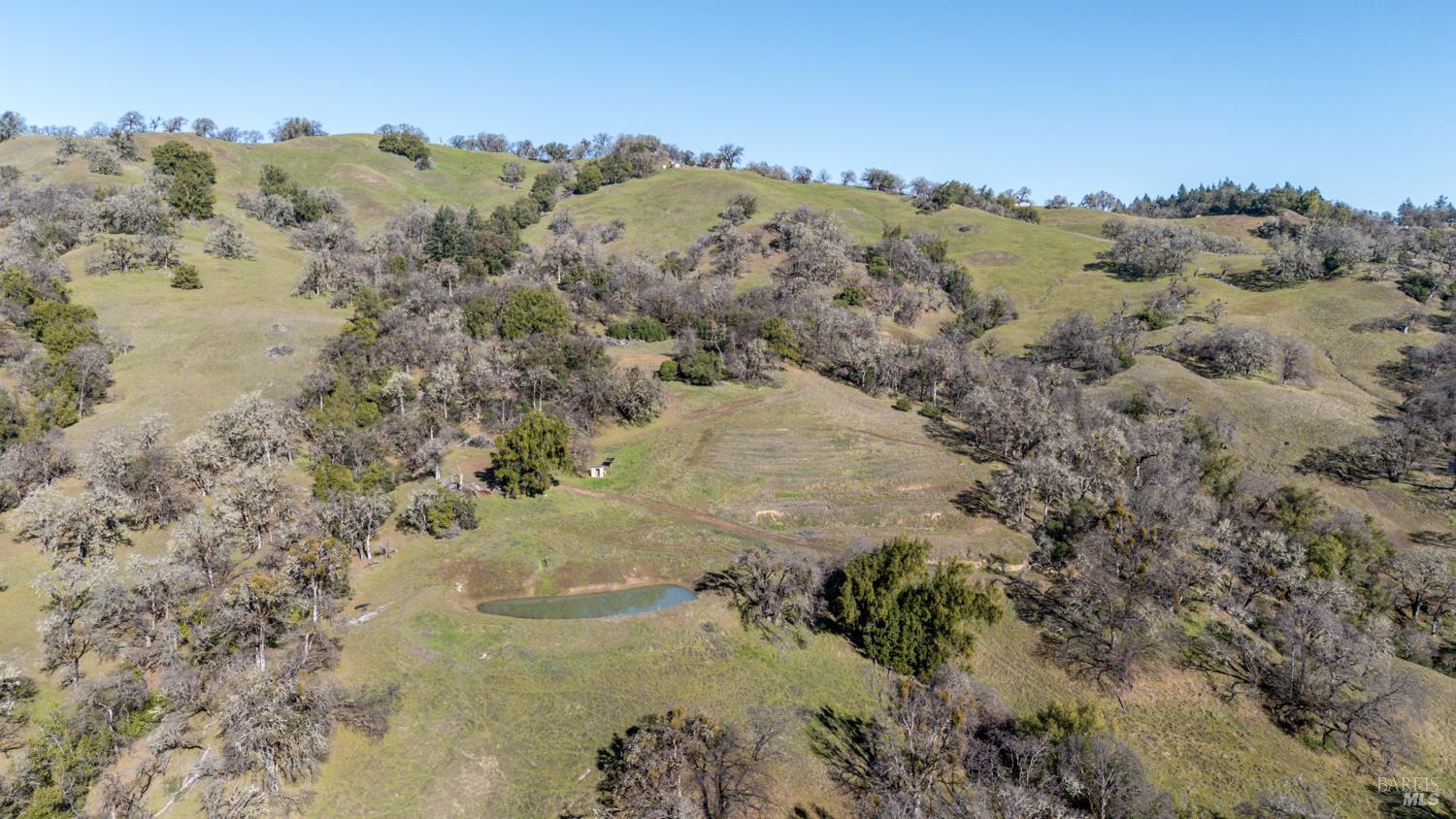 5400 Orr Springs Road Ukiah, CA 95482 - Photo 24 of 29 a view of a lake in between two of trees