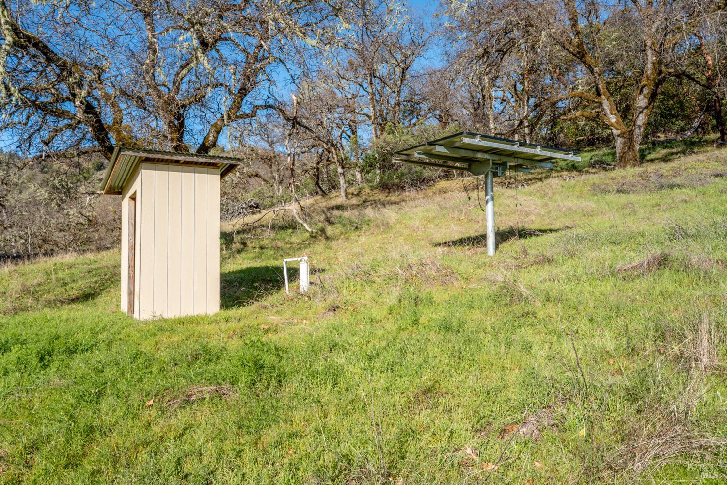 5400 Orr Springs Road Ukiah, CA 95482 - Photo 10 of 29 a backyard of a house with table and chairs