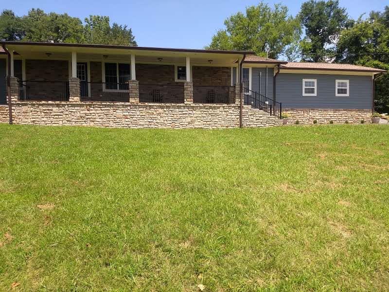 1154 Loftin Road Columbia, TN 38401 - Photo 1 of 8 a house view with a garden space