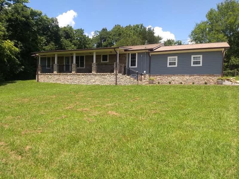 1154 Loftin Road Columbia, TN 38401 - Photo 2 of 8 a view of a house with a backyard