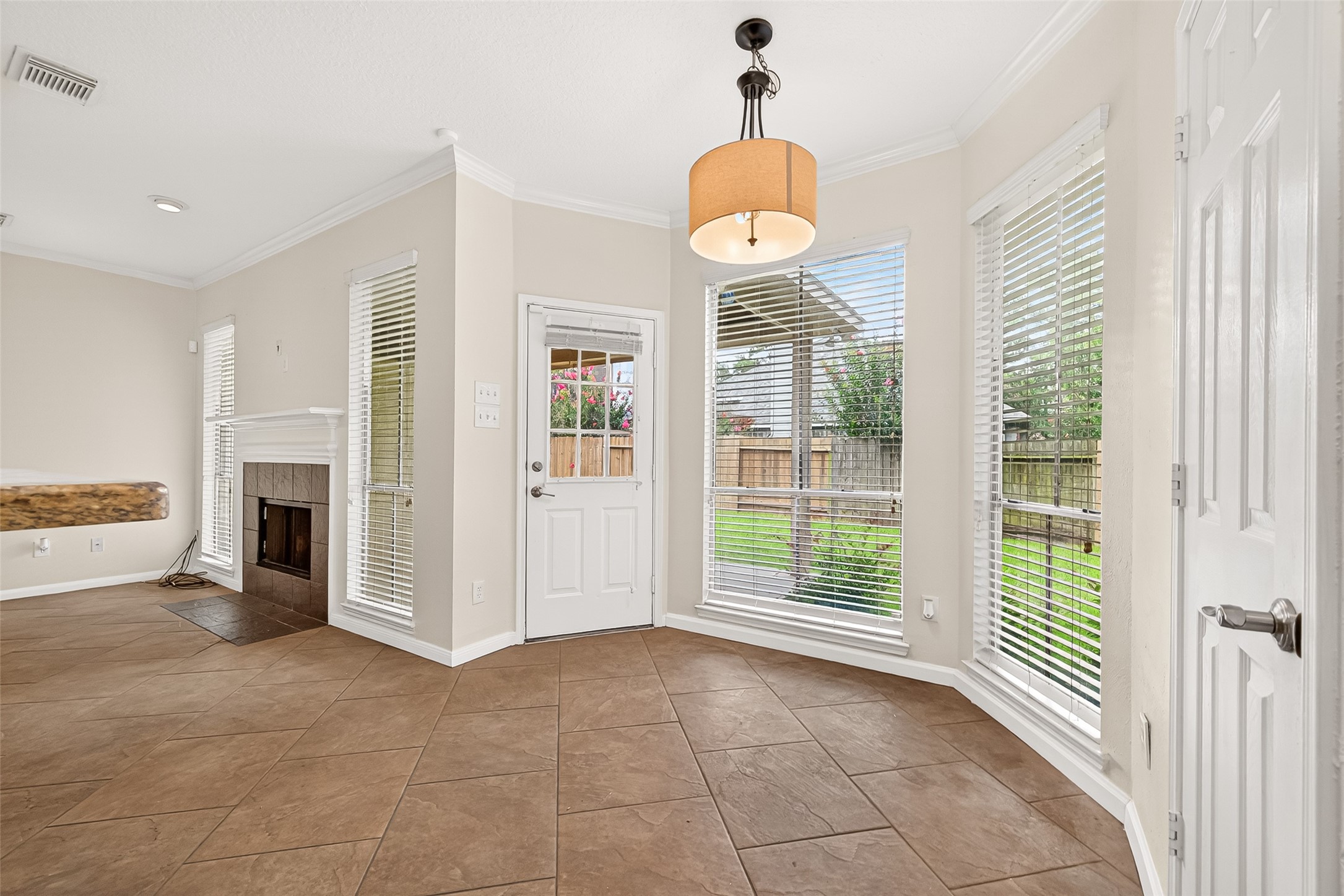 12831 Dove Point Lane Houston, TX 77041 - Photo 25 of 50 Breakfast area featuring a large window that fills the space with natural light and provides a perfect view of the backyard.