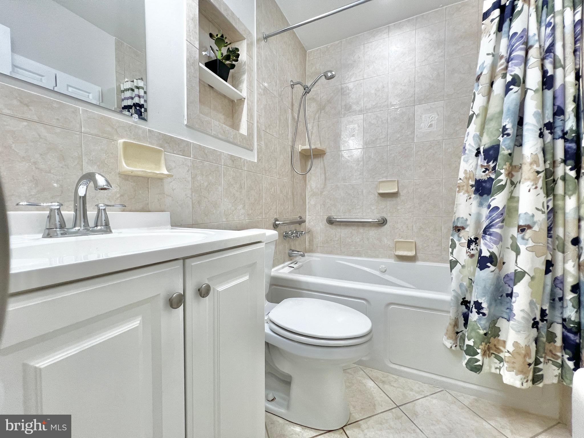 11218 Keystone Avenue Clinton, MD 20735 - Photo 18 of 53 a bathroom with a sink toilet and shower