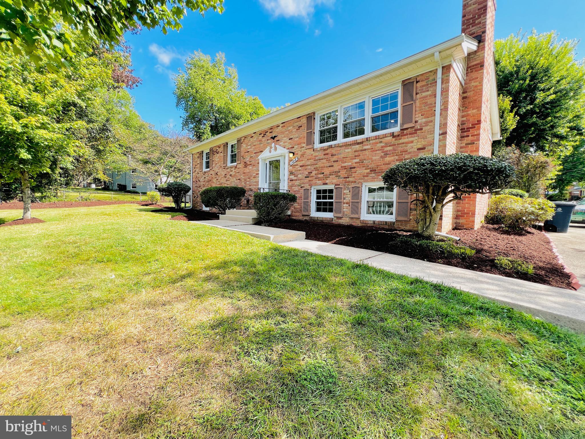 11218 Keystone Avenue Clinton, MD 20735 - Photo 45 of 53 a front view of house with yard and green space