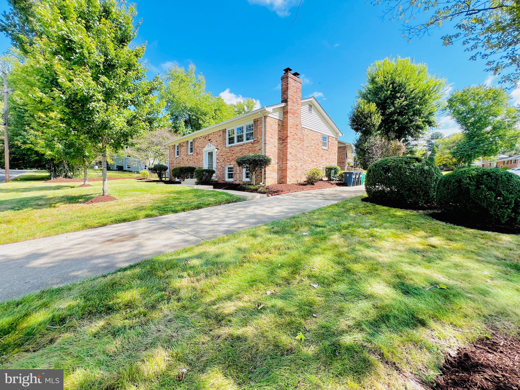 11218 Keystone Avenue Clinton, MD 20735 - Photo 46 of 53 a view of a house with a yard and garage