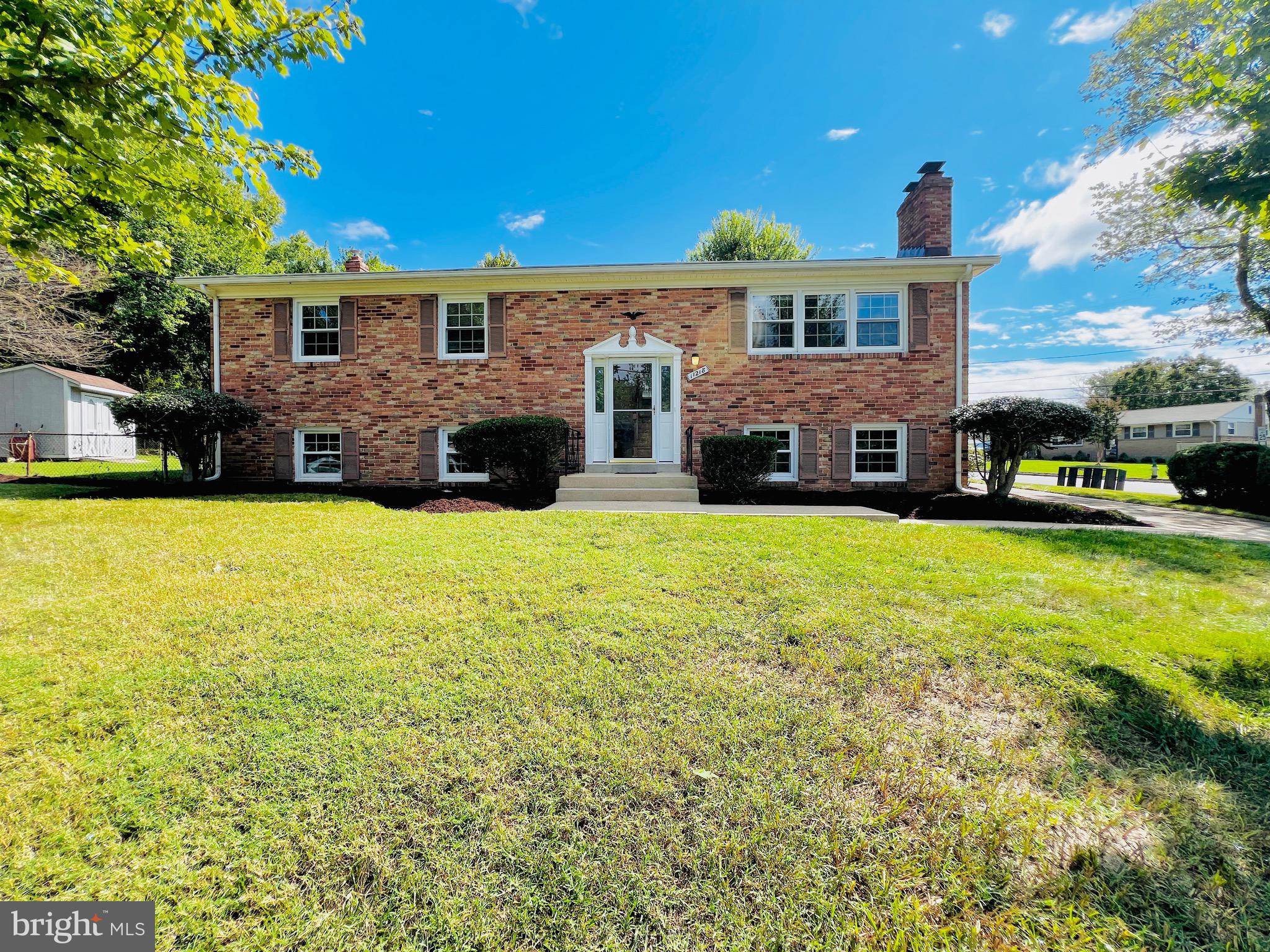 11218 Keystone Avenue Clinton, MD 20735 - Photo 48 of 53 a view of a house with swimming pool and a yard
