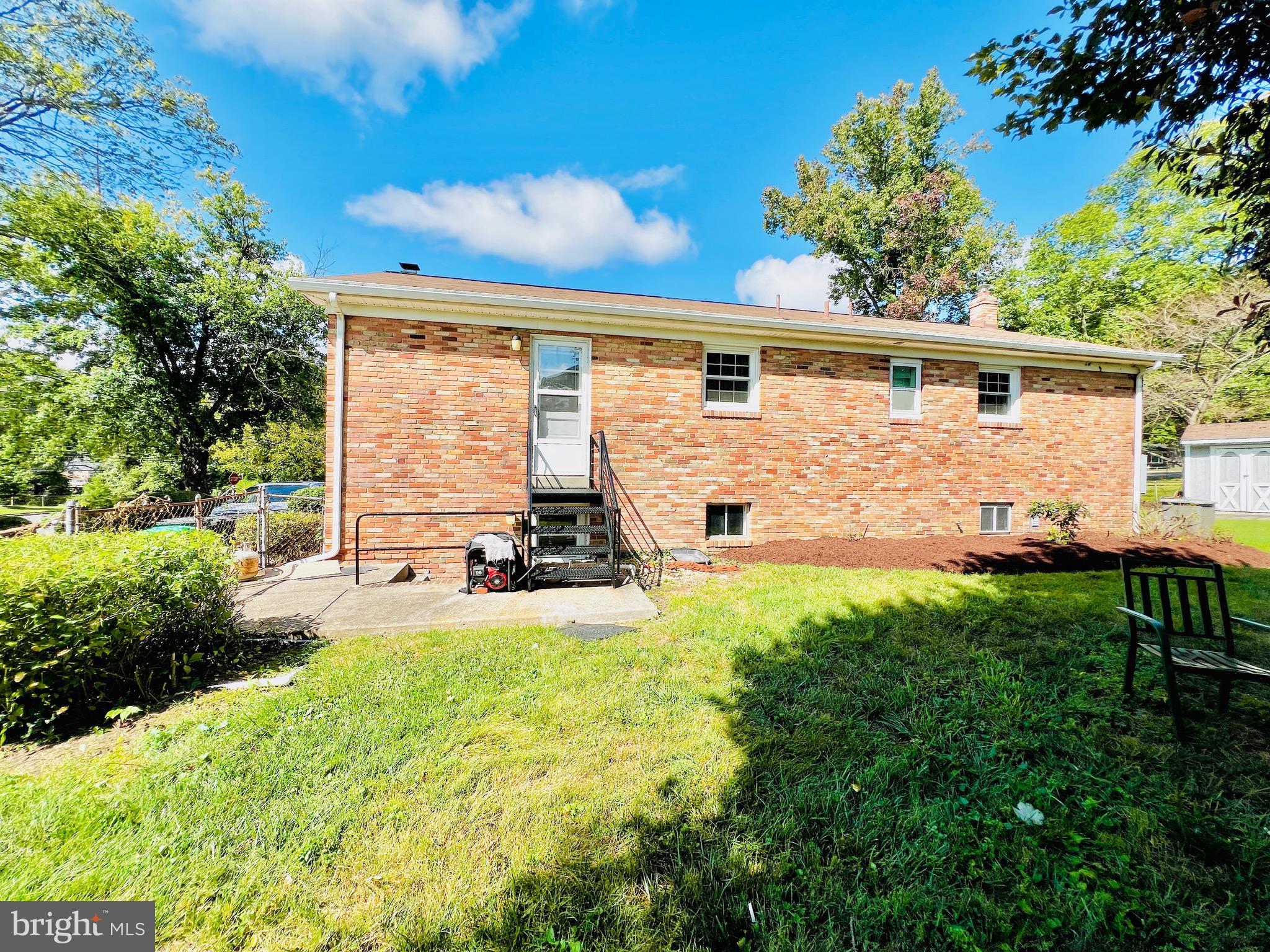 11218 Keystone Avenue Clinton, MD 20735 - Photo 51 of 53 a view of a house with backyard and sitting area