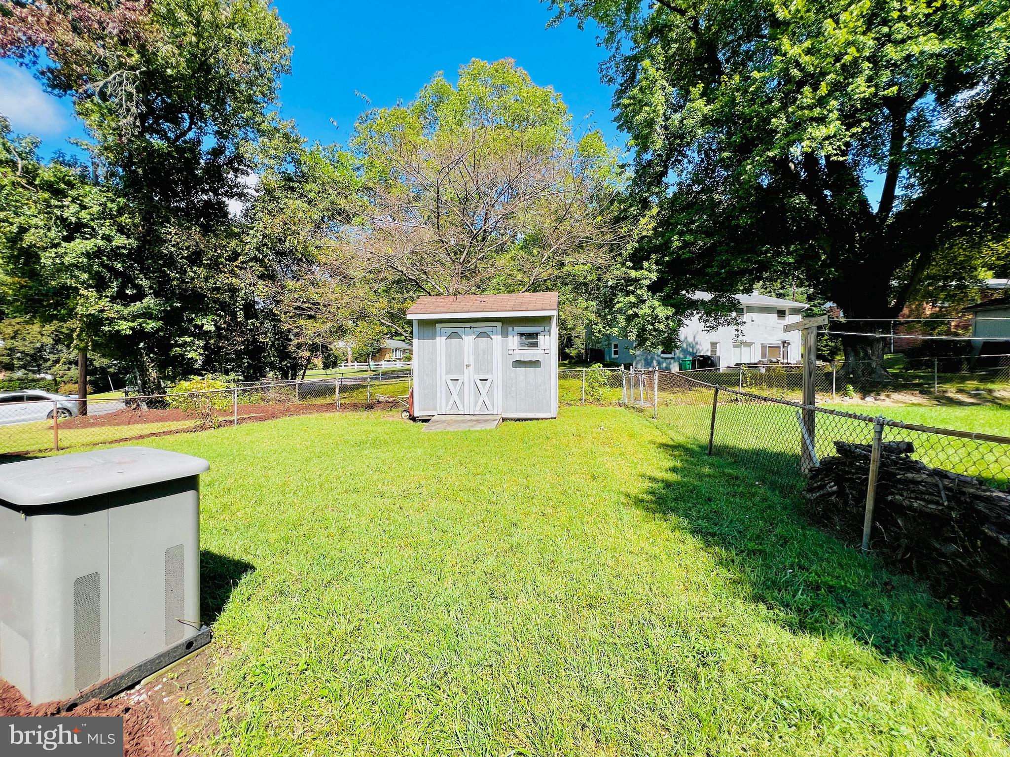 11218 Keystone Avenue Clinton, MD 20735 - Photo 53 of 53 a house view with a play ground in front of it