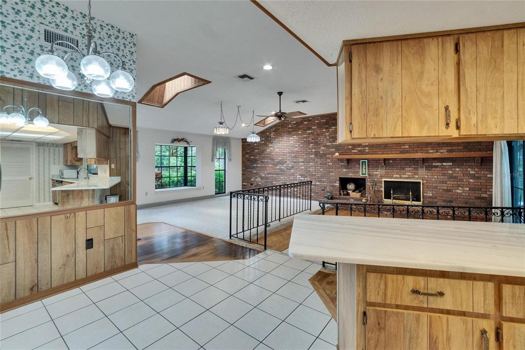 3102 East Trapnell Road Plant City, FL 33566 - Photo 66 of 100 a kitchen with stainless steel appliances granite countertop a sink and cabinets