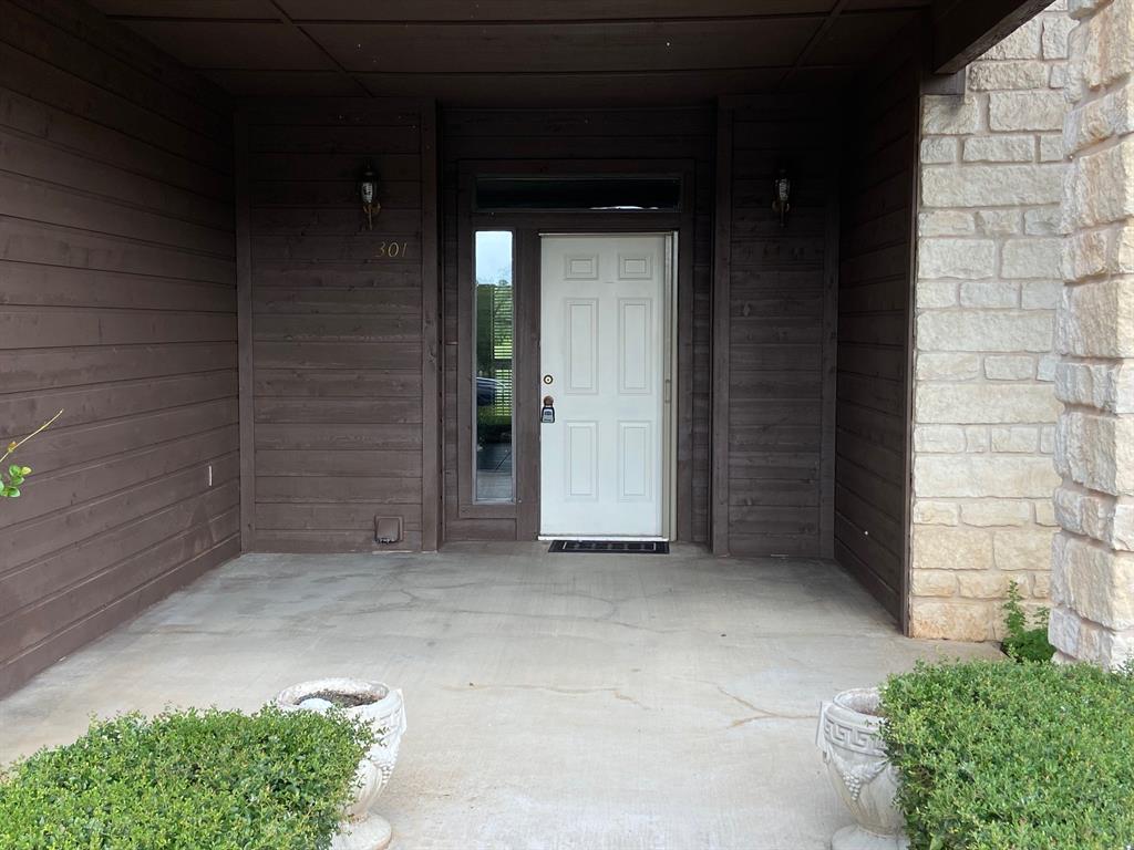 27101 Meadowmore Court Whitney, TX 76692 - Photo 2 of 31 a view of wooden door