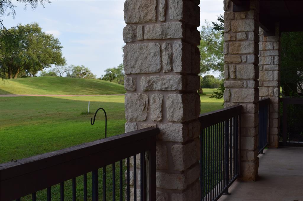 27101 Meadowmore Court Whitney, TX 76692 - Photo 21 of 31 a view of a lake from a balcony