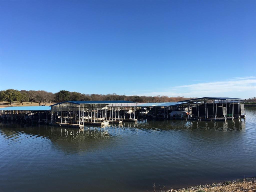 27101 Meadowmore Court Whitney, TX 76692 - Photo 27 of 31 a view of house with ocean view