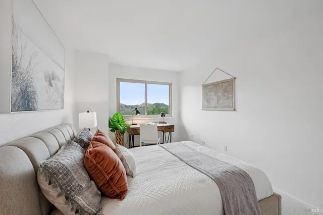 a bed room with a bed and a couch