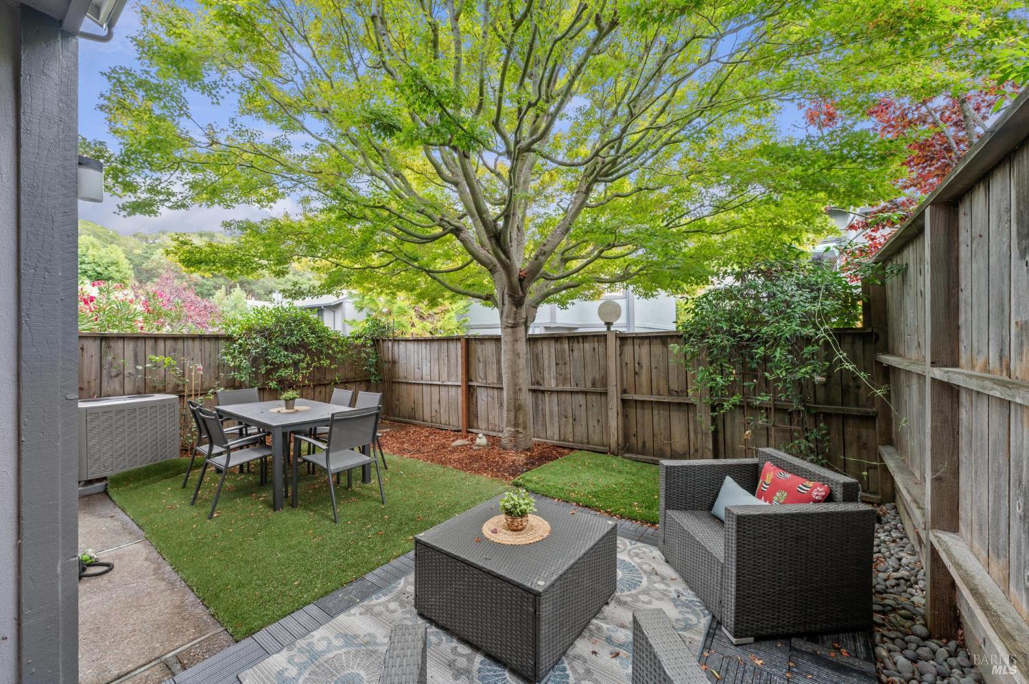 211 Danielle Way San Rafael, CA 94903 - Photo 27 of 33 a view of a backyard with couches table and chairs and potted plants