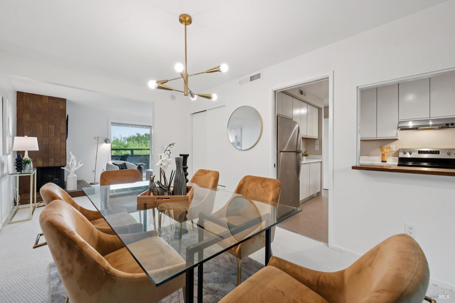 211 Danielle Way San Rafael, CA 94903 - Photo 8 of 33 a living room with furniture a flat screen tv and kitchen view