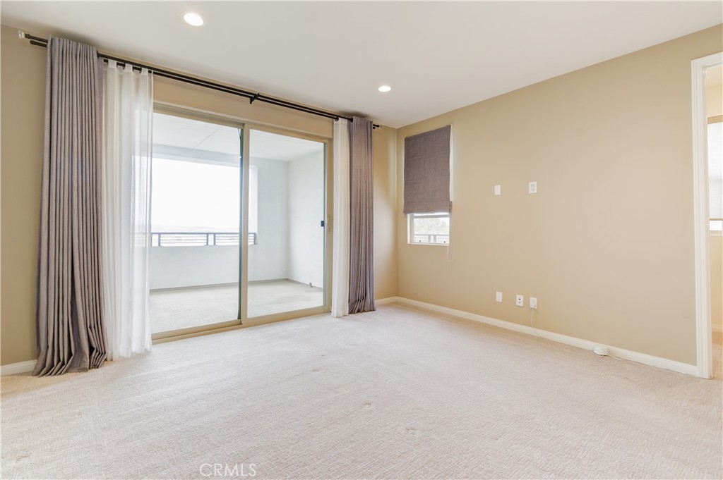 168 Spectacle Irvine, CA 92618 - Photo 18 of 42 a view of an empty room with a window