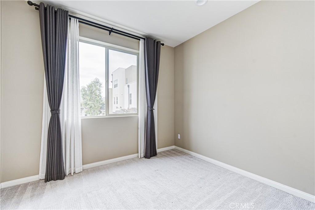 168 Spectacle Irvine, CA 92618 - Photo 29 of 42 an empty room with windows