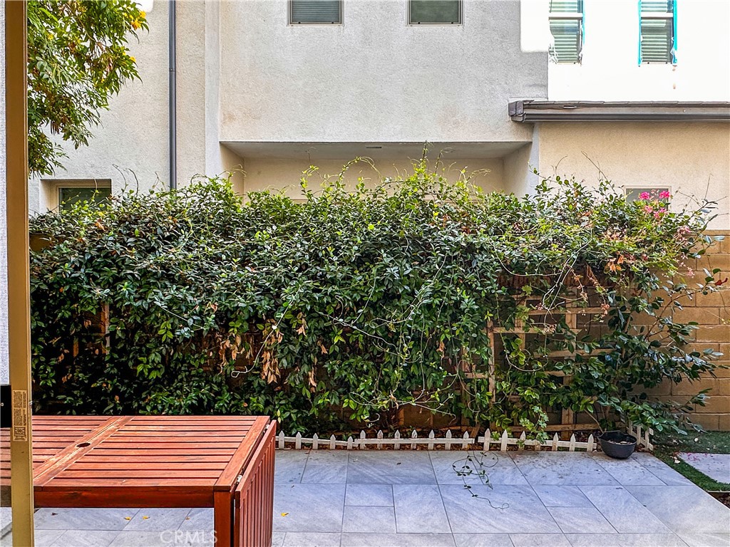 168 Spectacle Irvine, CA 92618 - Photo 38 of 42 a backyard of a house with lots of green space