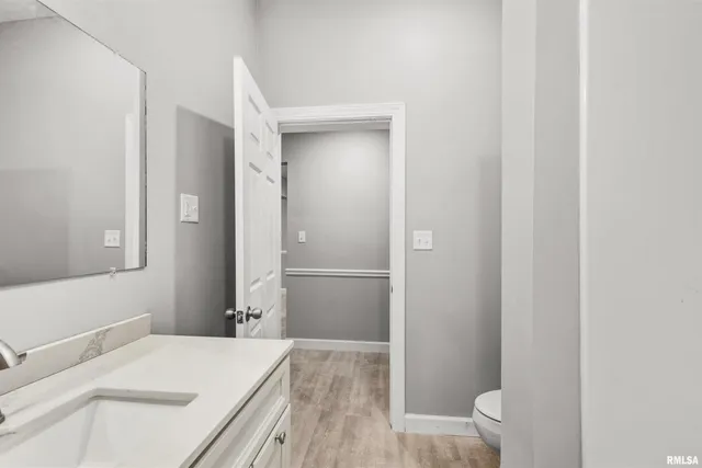 a bathroom with a sink and a vanity