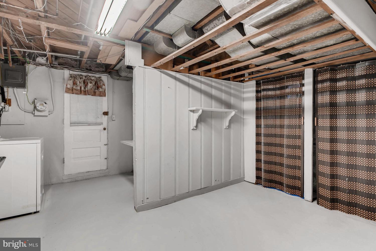 148 Hopkins Road Baltimore, MD 21212 - Photo 23 of 36 Laundry and storage area in lower level