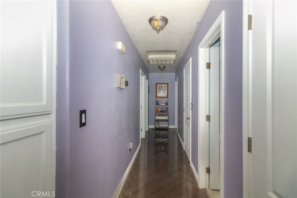 18936 Rock Springs Road Hesperia, CA 92345 - Photo 11 of 28 a view of hallway with stairs