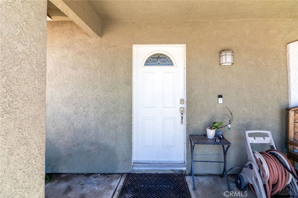18936 Rock Springs Road Hesperia, CA 92345 - Photo 3 of 28 a view of room with furniture and wooden floor
