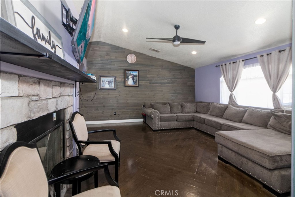 18936 Rock Springs Road Hesperia, CA 92345 - Photo 6 of 28 a living room with furniture and a large window