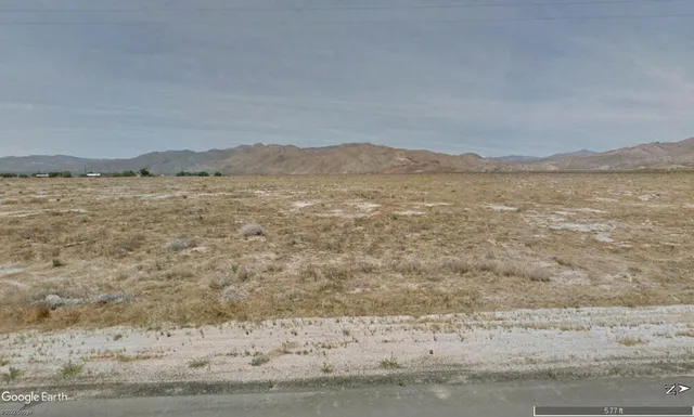 a view of lake and mountain