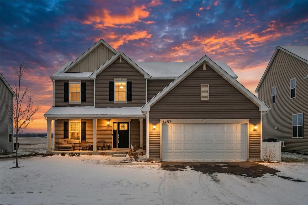 1457 Collins Street Elburn, IL 60119 - Photo 3 of 39 a front view of a house with yard