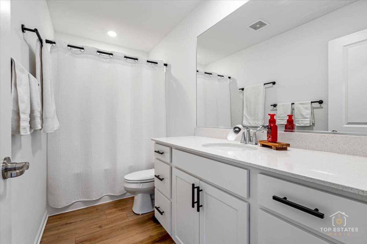 1457 Collins Street Elburn, IL 60119 - Photo 32 of 39 a bathroom with a double vanity sink mirror and toilet