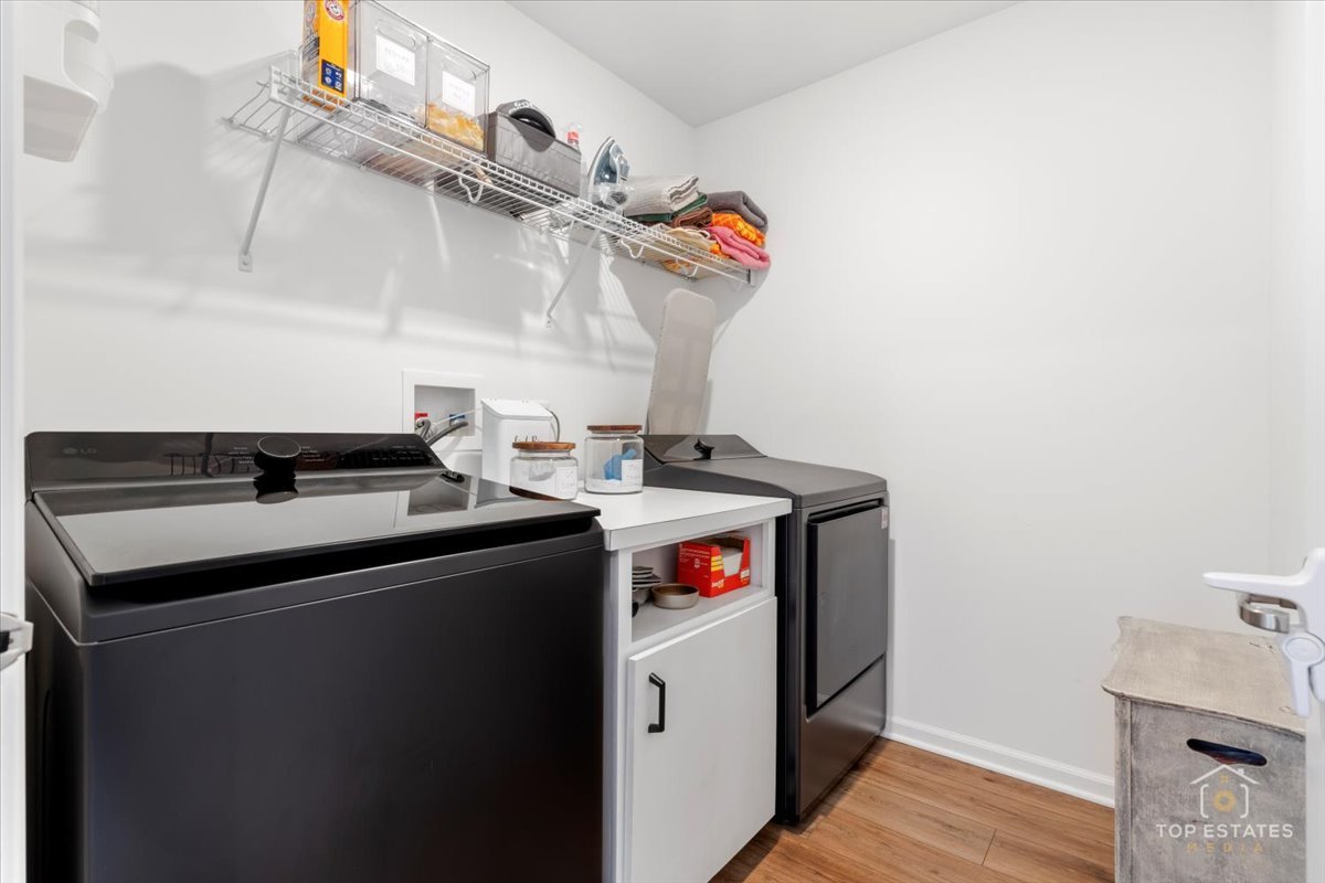 1457 Collins Street Elburn, IL 60119 - Photo 33 of 39 a utility room with dryer and washer