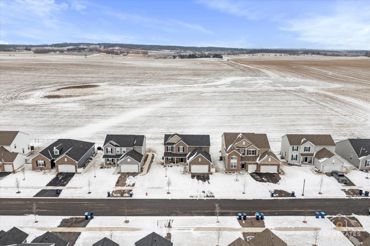 1457 Collins Street Elburn, IL 60119 - Photo 4 of 39 a view of an ocean and city